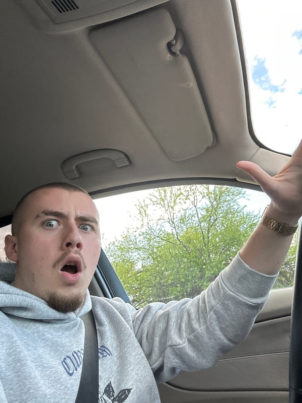 Man shows surprised reaction inside car in Sofia