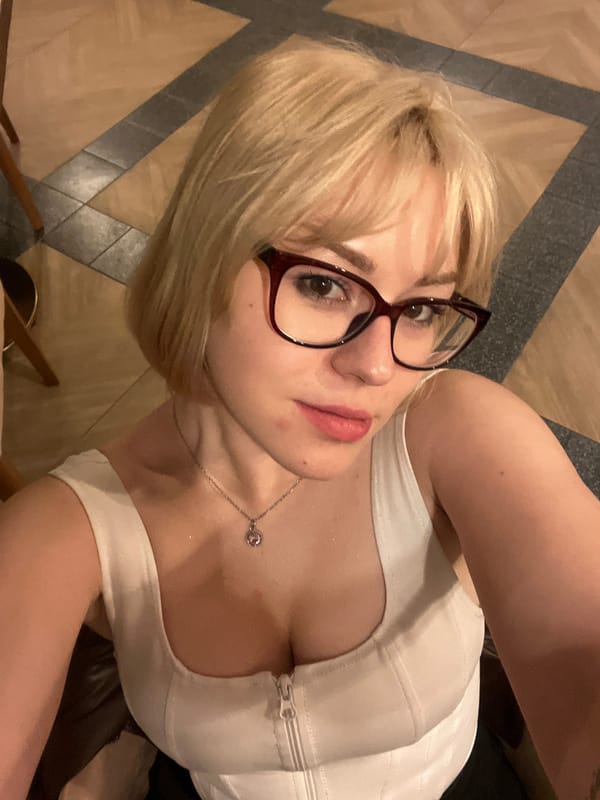 Woman takes selfies during dinner at Montenegro restaurant