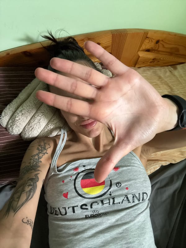 Woman photographed in bedroom setting in Pleven, Bulgaria