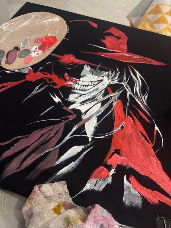 Artist works on skull painting in Krasnoyarsk studio