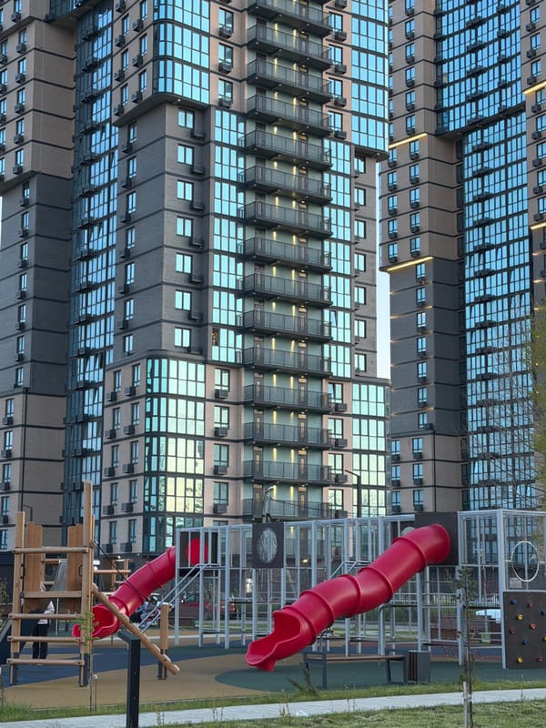 Families enjoy playground and outdoor gym in Beryozovy residential complex