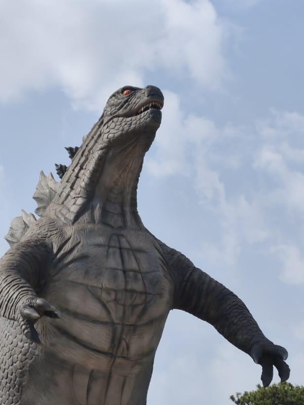 Godzilla statue photographed at Đà Lạt restaurant district