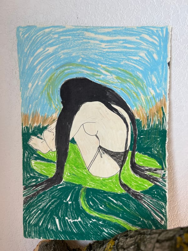 Artistic nude drawing captured in fetal position sketch