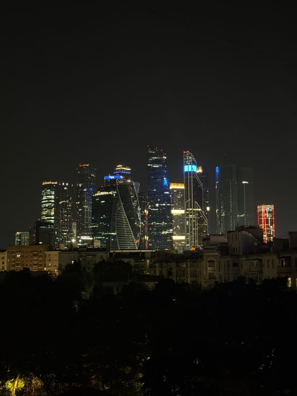 Moscow City towers at night, plus a late pizza
