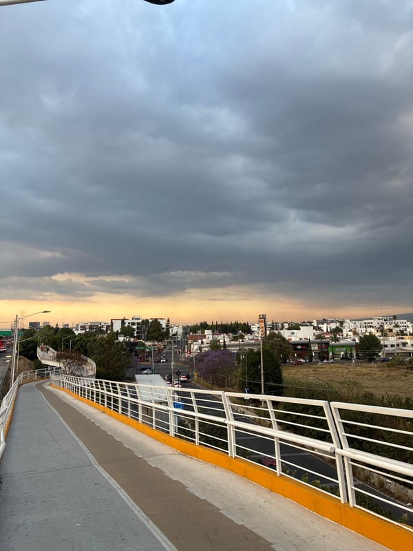 Street scene captured from pedestrian overpass in San Andrés Cholula