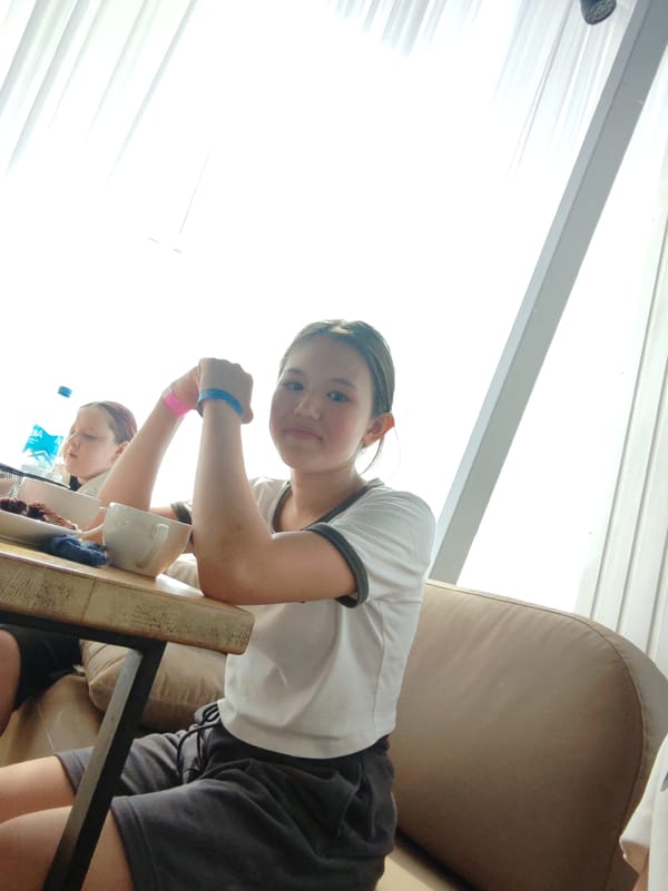 Birthday party in Amursk: cake, flowers, and a butterfly lollipop