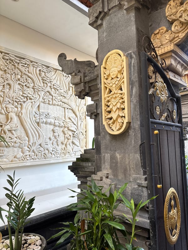 Temple visit with ornate stone carvings and decorated Ganesha statues