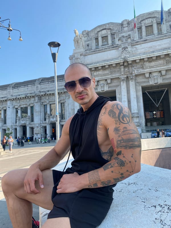 Hanging out near Milan's baseball sculpture on a summer morning
