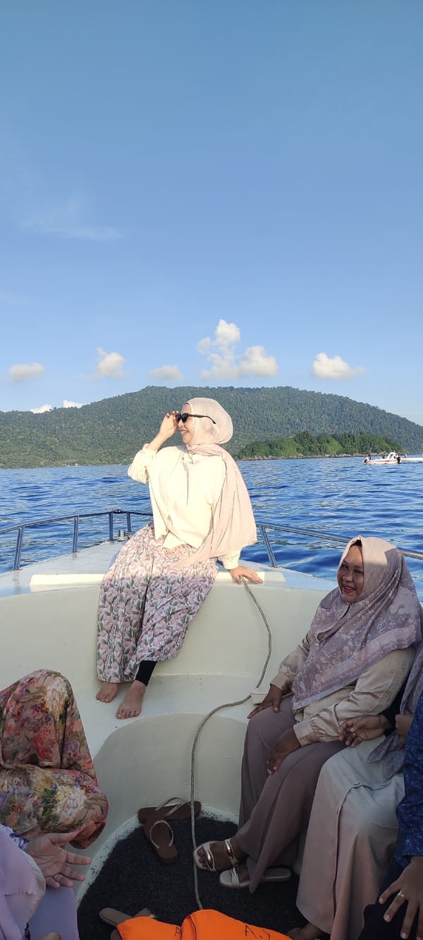 Boat trip near mountainous island in Sabang waters