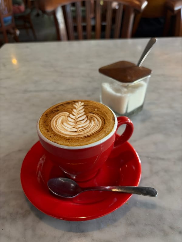 Coffee and latte art at a North Kuta café
