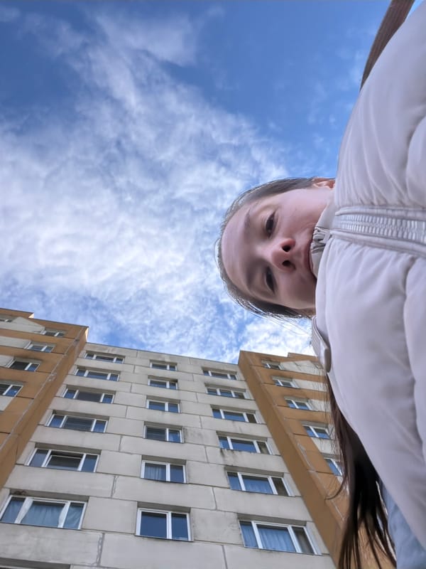 Woman photographed outdoors in Staraya, Russia amid spring weather