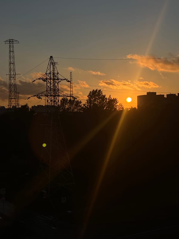 Saint Petersburg sunset silhouettes city skyline in warm orange light