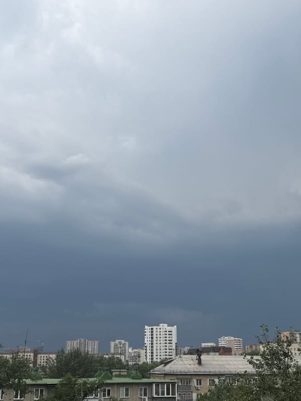 Storm clouds over Chelyabinsk, casual indoor moments alongside.