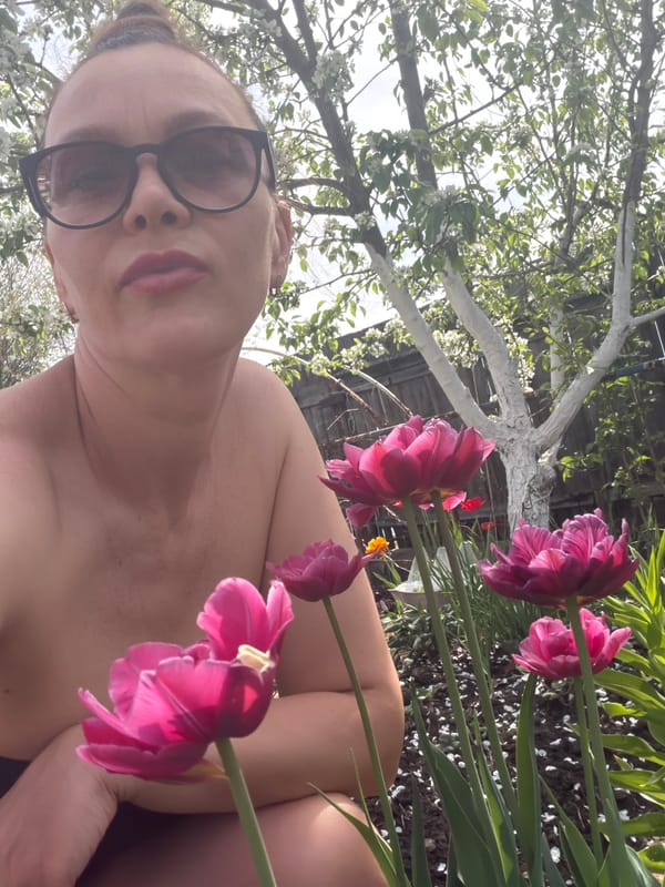 Woman documents garden photoshoot in Chaikovsky, Russia