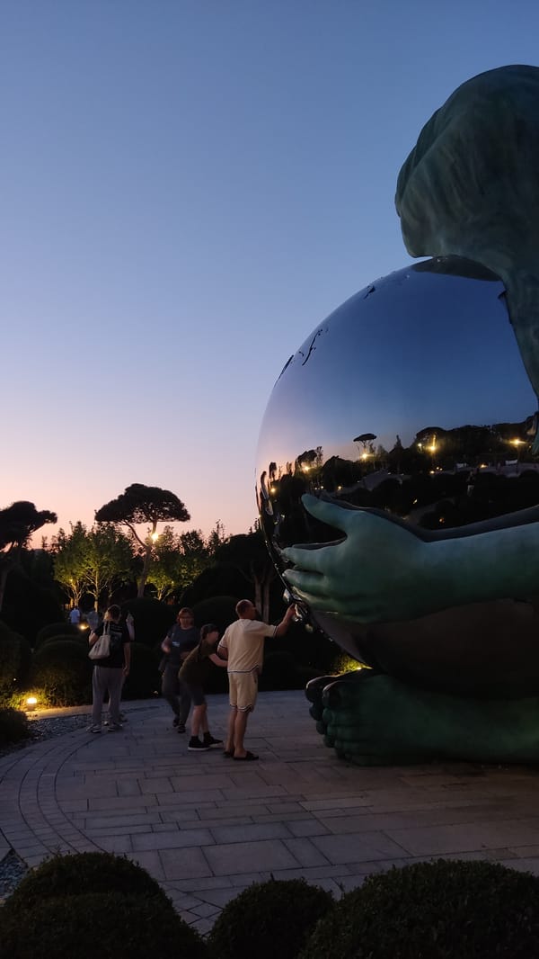 Evening at Krasnodar's globe sculpture and fountain monument