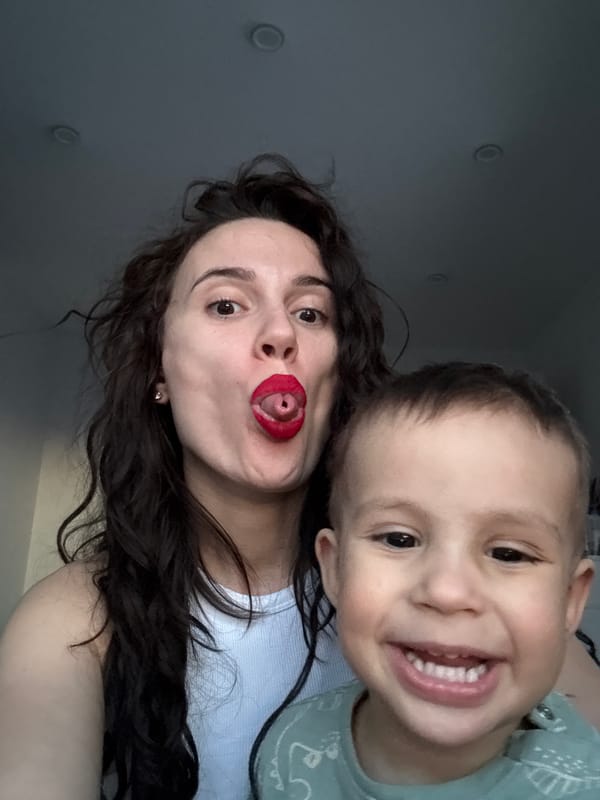 Woman and child share playful selfie moment in Chaikovsky