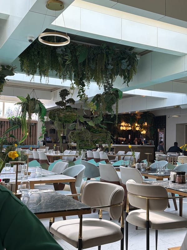 Woman visits modern restaurant in Constanța, Romania