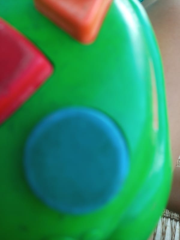 Person documents children's toy collection in Venezuelan village