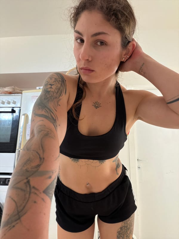 Woman photographed in athletic wear indoors in Kiryat Bialik