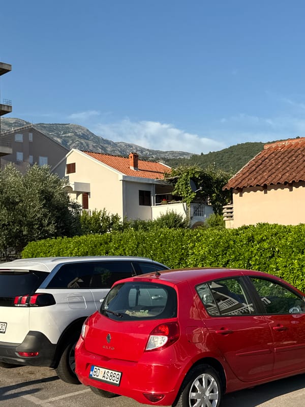 Various vehicles parked across Budva Montenegro residential areas