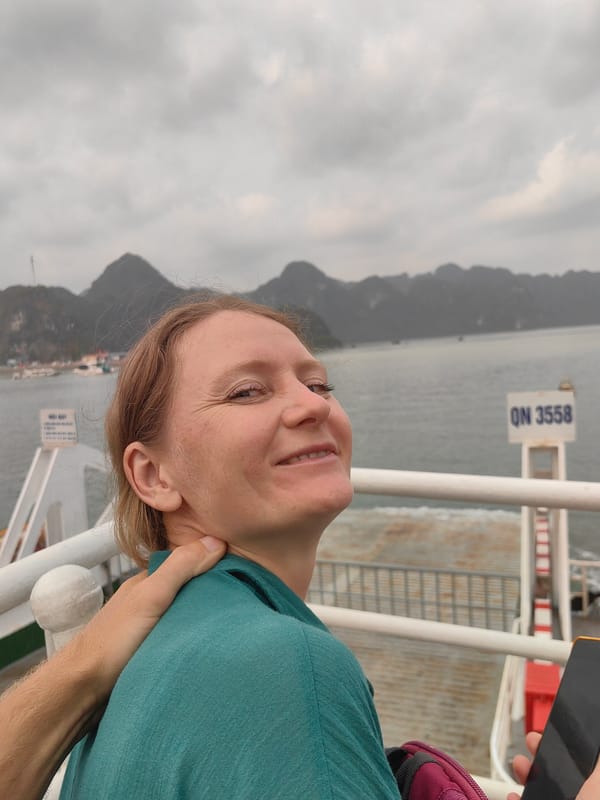Ferry passengers travel through Hải Phòng waters on cloudy morning