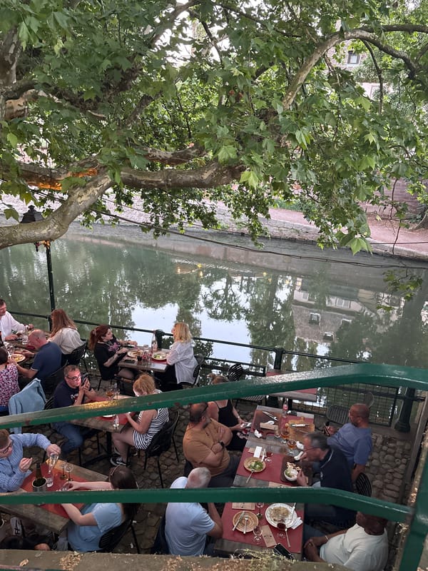 Canal-side diners enjoy evening meal in Strasbourg