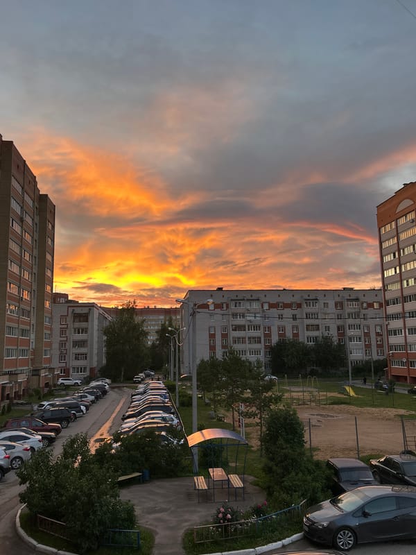 Vivid summer sunset over a Yoshkar-Ola residential courtyard