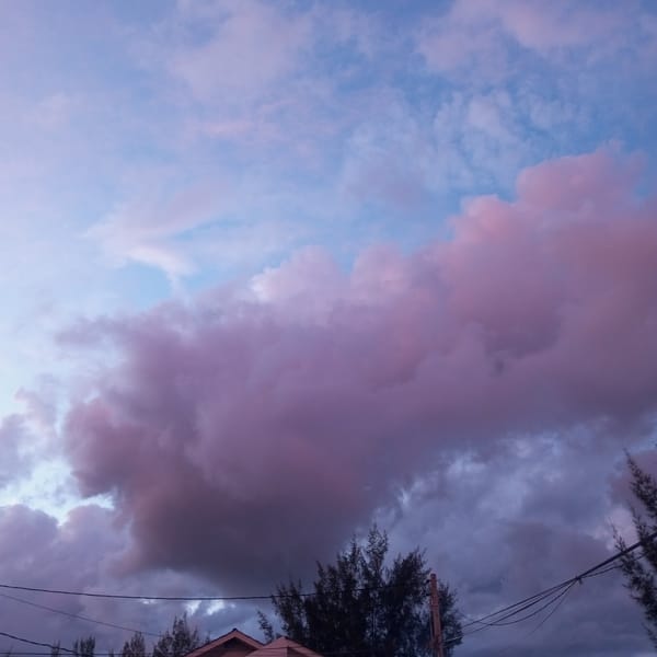 Sunset clouds over Lhokseumawe rooftops, multiple angles
