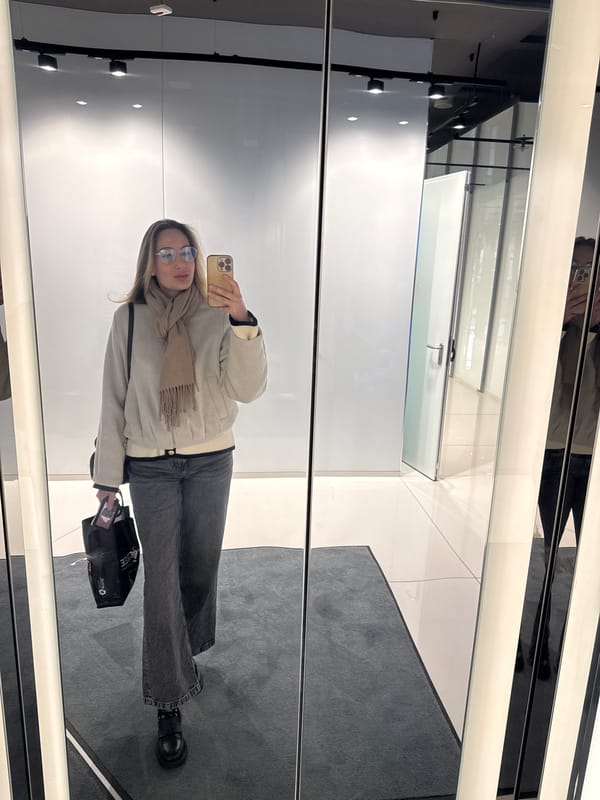 Woman Takes Selfie in Riga Commercial Space Early Morning