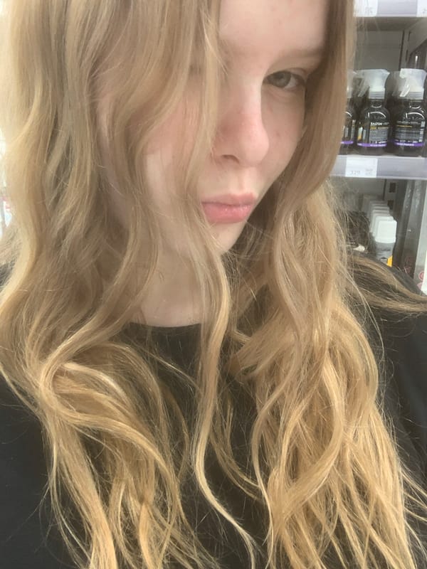 Blonde shopper documents retail trip through Saint Petersburg mall