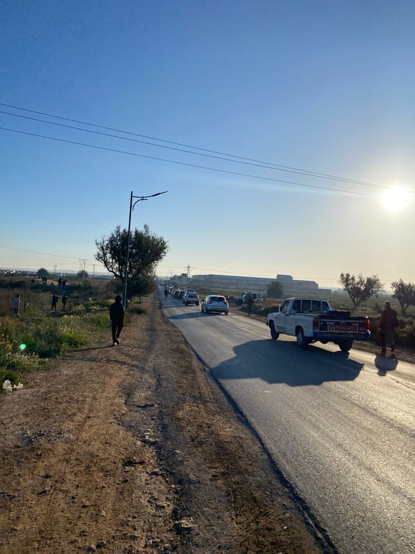 Morning car market activity captured in Ben Freha, Algeria
