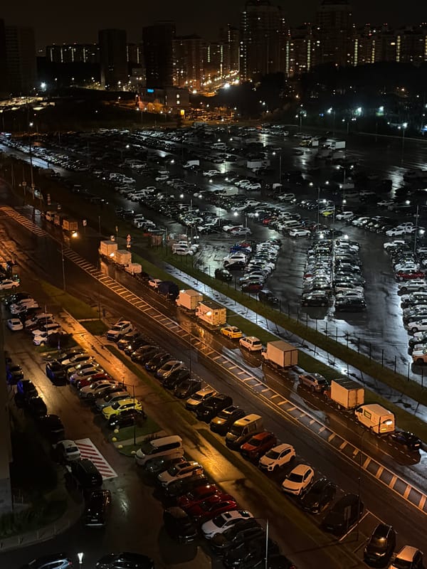Night aerial views over Moskovskiy's residential blocks and parking lots