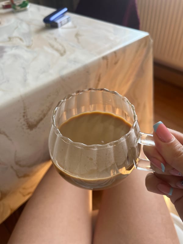 Morning coffee moment captured by window in Saarbrücken