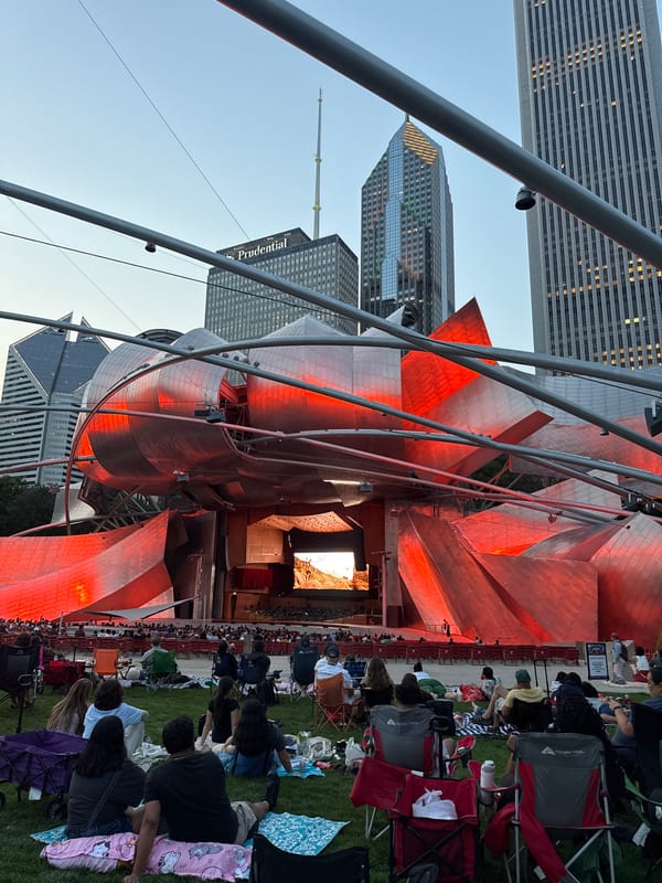 Jay Pritzker Pavilion glows on a clear Chicago evening