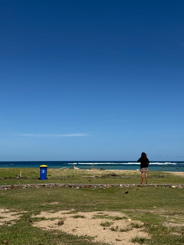 Morning beach activity captured in Kuta, Indonesia