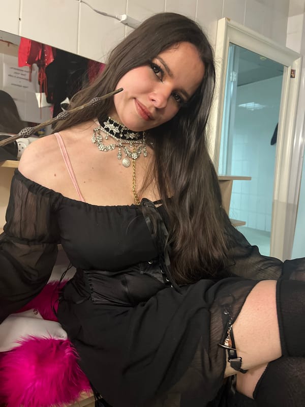 Woman photographed indoors at unknown location early Sunday morning