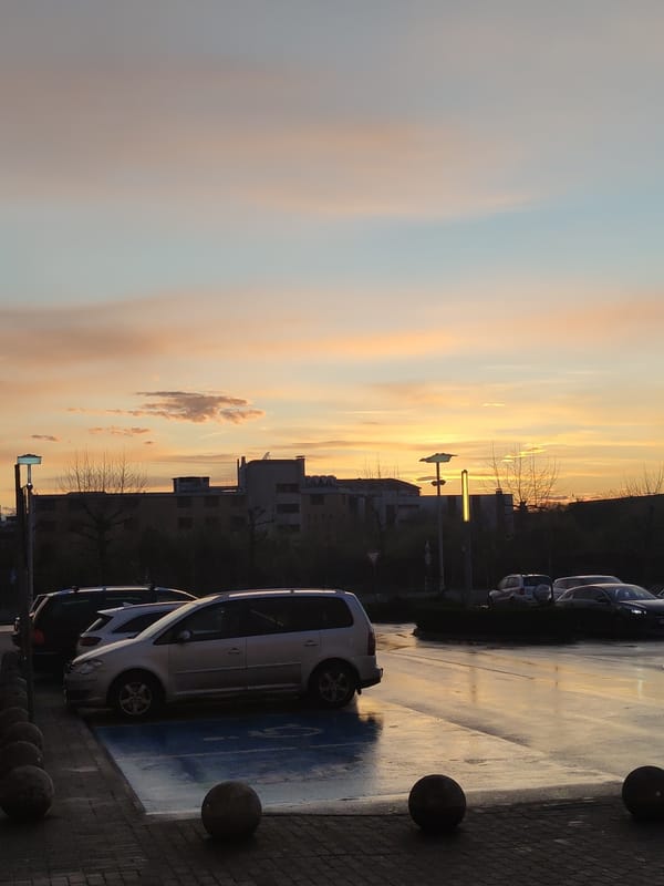 Car parked in handicapped space during sunset in Ruse