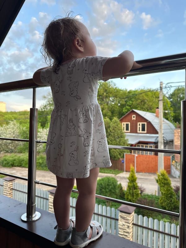 Children play on balcony under supervision in Nizhny Novgorod