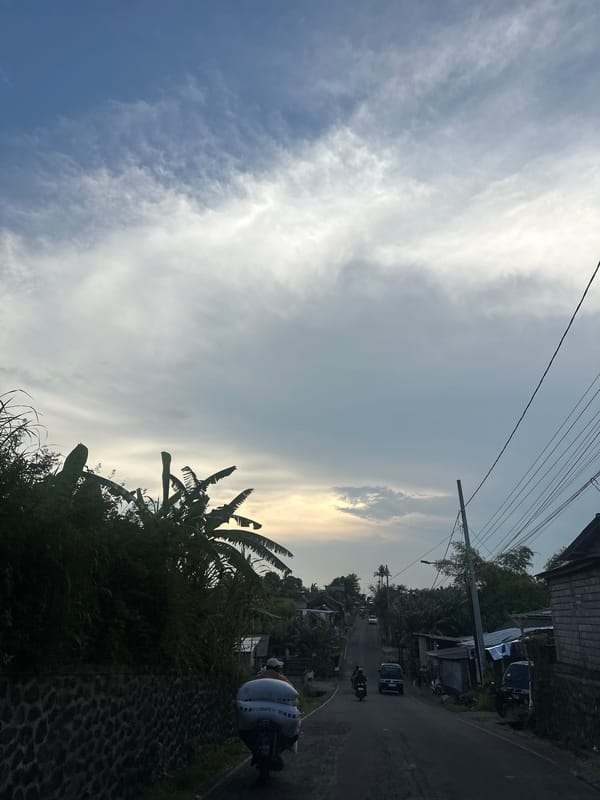 Street scene captured in Sibanggede, Indonesia during cloudy day