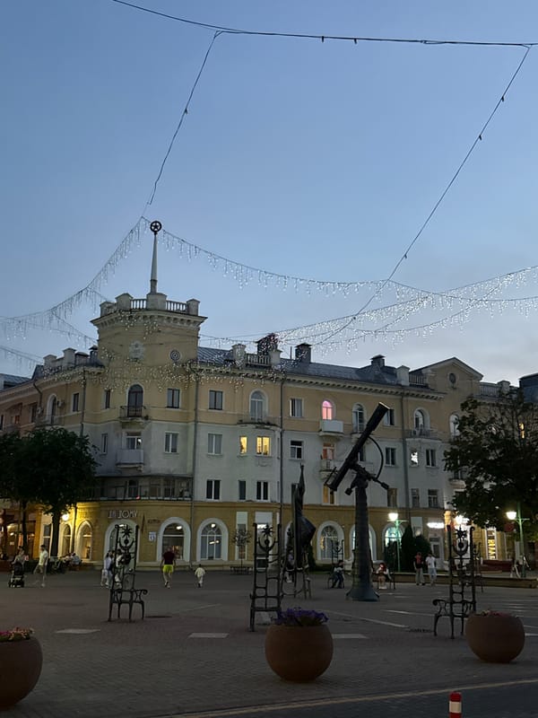 Summer evening in Mahilyow's city square, lights and popsicles