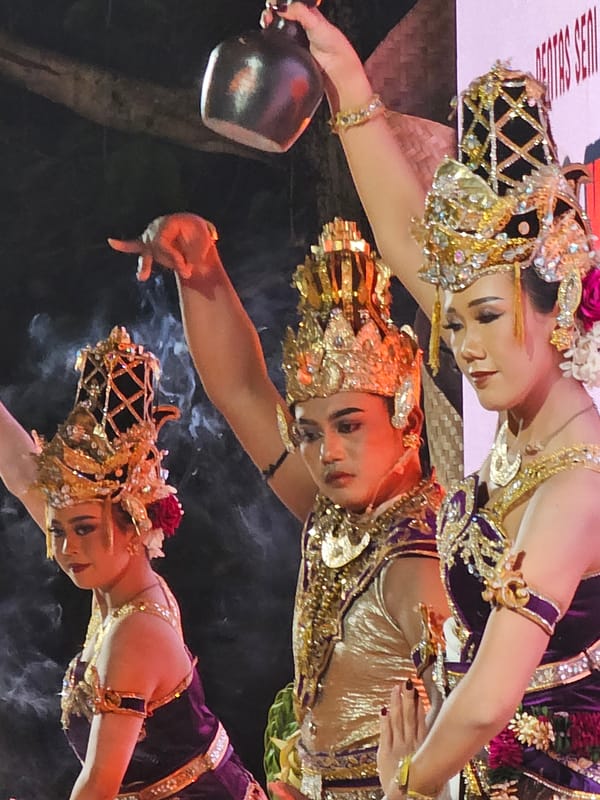 Traditional Balinese dancers perform at beachside venue in Denpasar