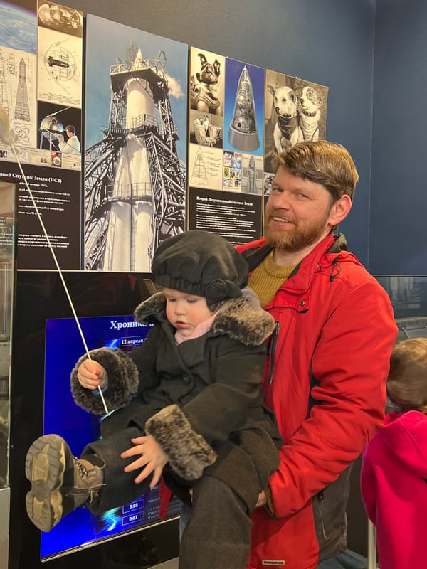 Father and child explore Soviet space museum in Saint Petersburg
