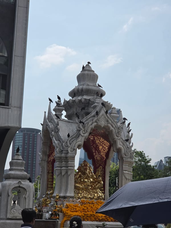 Morning activity documented at Bangkok's Erawan Shrine and vicinity