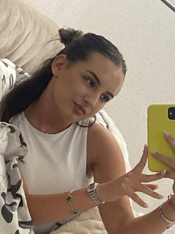 Woman photographed in bedroom and car with dog in Bulgaria