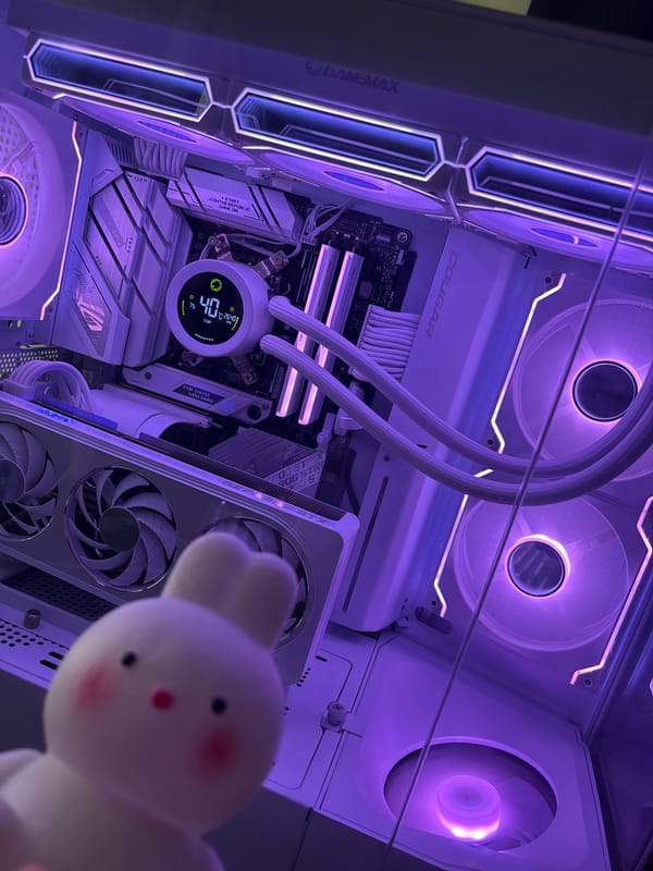 Purple-lit gaming PC paired with collectibles and outdoor scenery