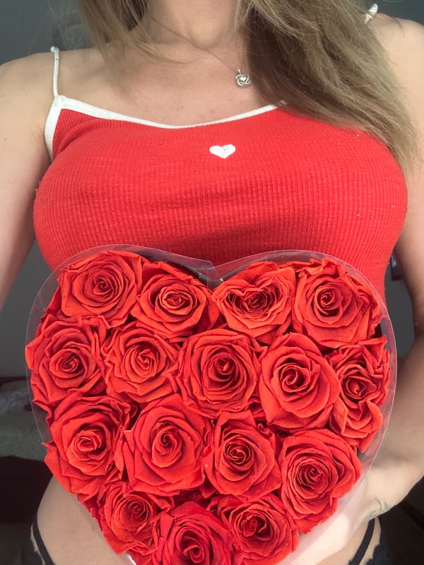 Heart-shaped box of red roses in Kharkiv