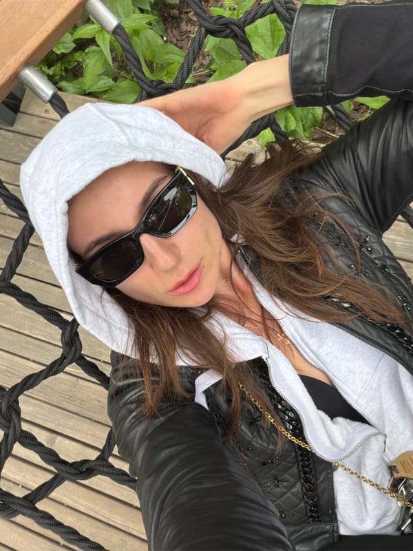 Relaxing on a wooden platform amid greenery in Moscow