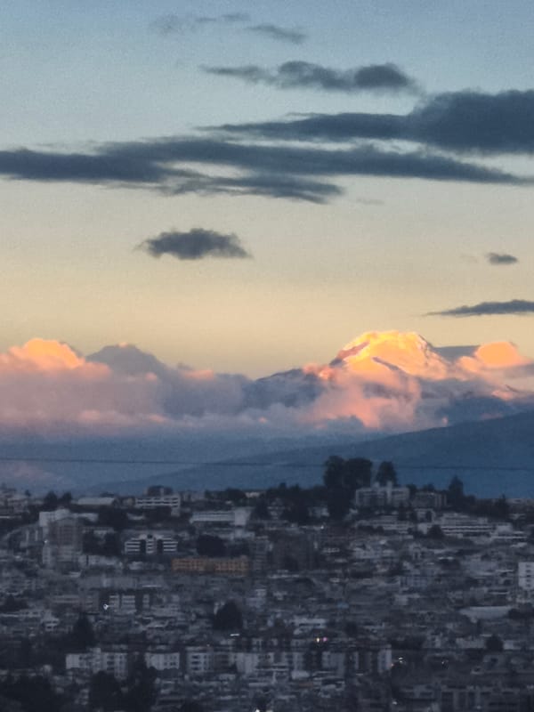 Sunset views captured over Quito's mountain cityscape