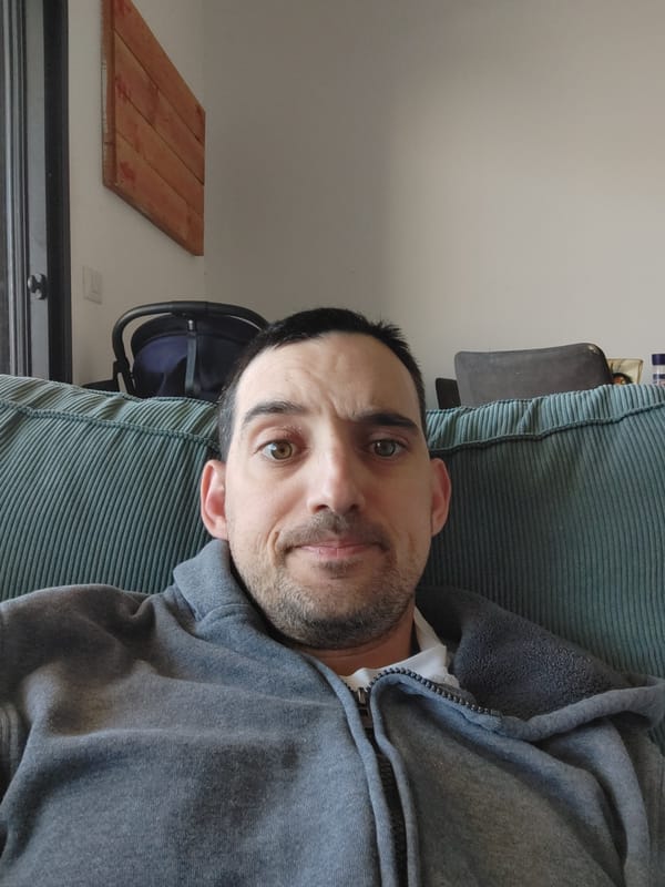 Man rests on cushion in Tel Aviv