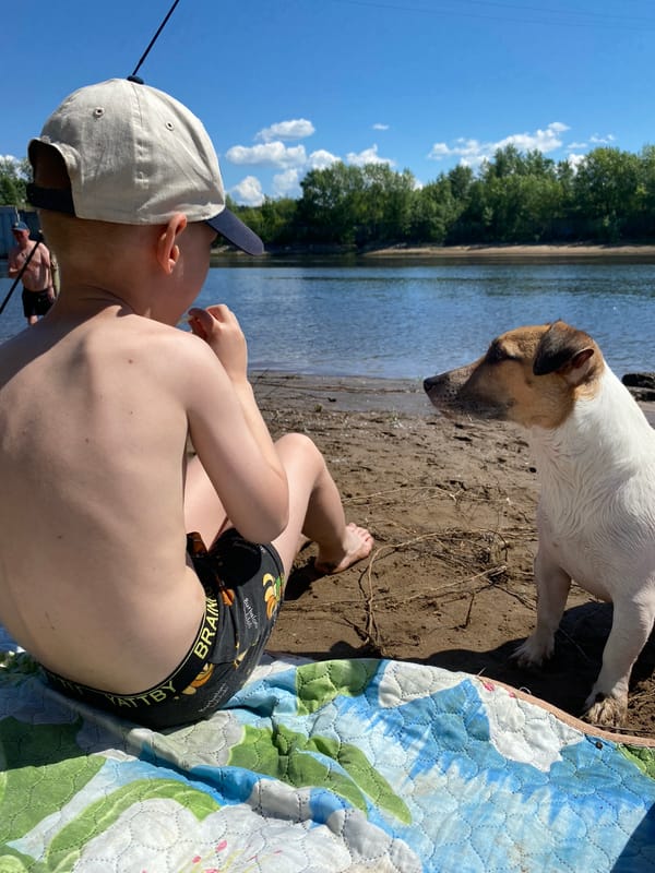 Family enjoys morning fishing trip on Kama River